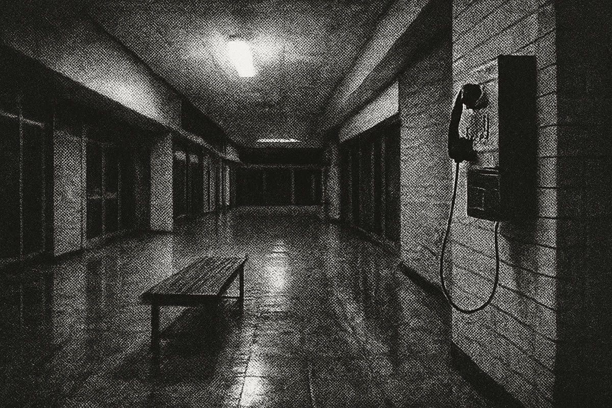 Empty mall corridor at night with a payphone receiver hanging off the hook, halftone photo